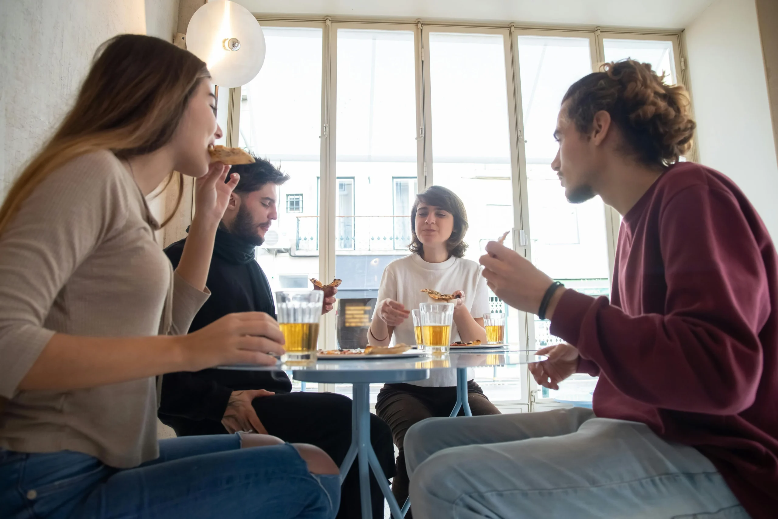 couples talking at a table.